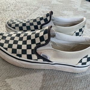 Black checkered slip on vans